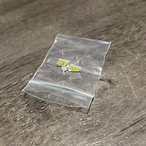 Sterling silver never worn cheese wedge post earrings.